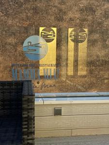 a mural on the side of a building with graffiti at Mamma Mia Hotel Boutique - Only Adults in Tossa de Mar