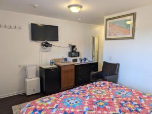 Kuchyň nebo kuchyňský kout v ubytování Apple Inn and Suites Cooperstown Area