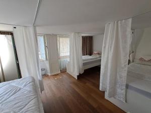 Krevet ili kreveti u jedinici u okviru objekta Friendly Hostel Zürich