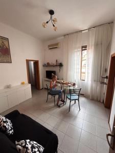 Posedenie v ubytovaní Accogliente Appartamento vicino al Centro e alla Fiera