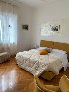 Postel nebo postele na pokoji v ubytování SoleMare Rooms Trieste