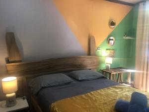 A bed or beds in a room at Tucan