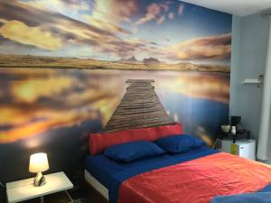 A bed or beds in a room at Tucan
