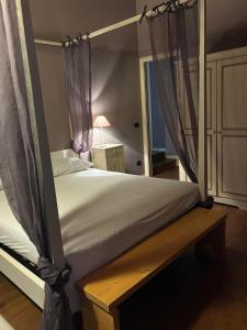 เตียงในห้องที่ Tenuta Ca' Bella +28 ภาพ