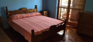 Postel nebo postele na pokoji v ubytování Le Chat Riant Deluxe
