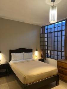 Postel nebo postele na pokoji v ubytování Hostel Inn