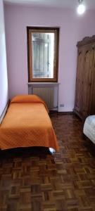 Postel nebo postele na pokoji v ubytování Le Chat Riant Deluxe