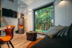 Posezení v ubytování Cocodeno-'Virš Ąžuolų' - Forest SPA - FREE jacuzzi