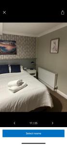 a picture of a bedroom with a white bed at Kings head in Chacewater
