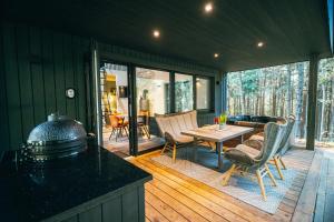 Posezení v ubytování Cocodeno-'Virš Ąžuolų' - Forest SPA - FREE jacuzzi