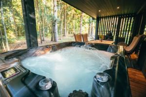 Fotografie z fotogalerie ubytování Cocodeno-'Virš Ąžuolų' - Forest SPA - FREE jacuzzi v destinaci Paplatelė