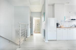 Kuchyňa alebo kuchynka v ubytovaní APARTAMENTY "LA VILLA" SUPERIOR II z dwoma sypialniami, balkonem, parkingiem, blisko centrum