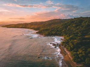 an aerial view of the shoreline of a beach at New Beachfront House - Casa Aura in Santa Teresa Beach