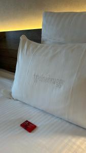 Postel nebo postele na pokoji v ubytování Hotel Restaurant Weinebrugge
