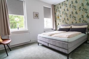 Postel nebo postele na pokoji v ubytování Ferienhaus Kleiner Kaiser