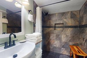 a bathroom with a sink and a shower at View for Two in Ellijay
