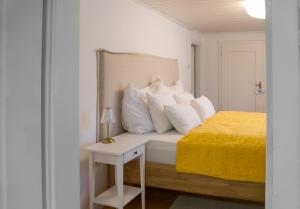 Postel nebo postele na pokoji v ubytování Ferienhaus Alexandra in Ebensee