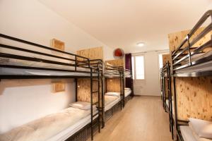 Postel nebo postele na pokoji v ubytování Le Flâneur Guesthouse