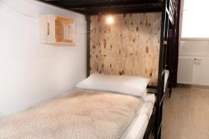 Postel nebo postele na pokoji v ubytování Le Flâneur Guesthouse
