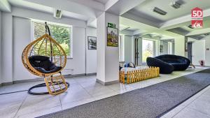 Część wypoczynkowa w obiekcie Apartament SPA 44 Resort Kozubnik blisko Szczyrk- 5D Apartamenty