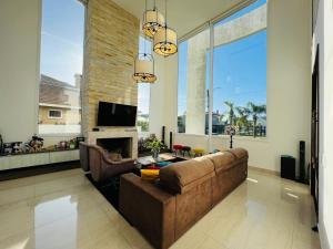 Μια τηλεόραση ή/και κέντρο ψυχαγωγίας στο Verão dos Sonhos no Condomínio Quintas do Lago