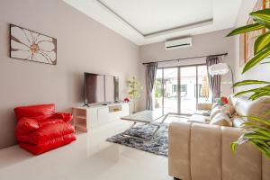 Posezení v ubytování Hidden Cove Pool Villa 11BR 15 Mins Jomtien Beach 11臥室泳池派對別墅 花園燒烤