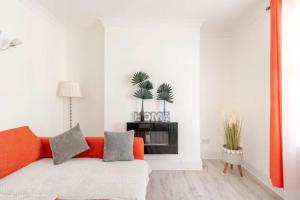 Ένα ή περισσότερα κρεβάτια σε δωμάτιο στο Castle View 2 Bedroom Apartment in Town Centre