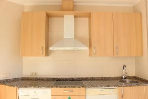 Una cocina o zona de cocina en Apartaments Plaza Príncipe Viana