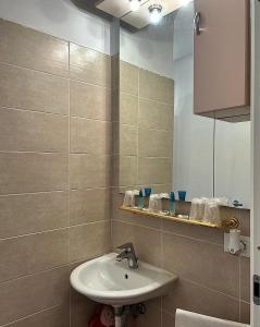a bathroom with a sink and a mirror at B&B La Casa D Ju Nan in Bussi sul Tirino +44 photos