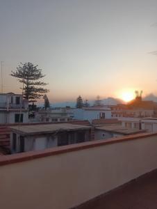The sunrise or sunset as seen from a panziókat or nearby