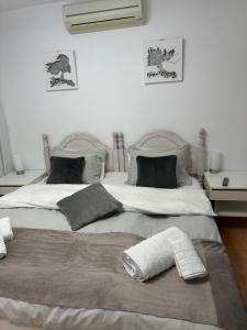 Posteľ alebo postele v izbe v ubytovaní Casa Lanjaron