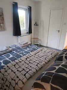 2 bed highland home base for Isle of Skye and Lochalsh客房内的一张或多张床位