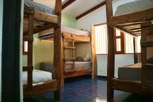 Postel nebo postele na pokoji v ubytování Tropical Camas hostel