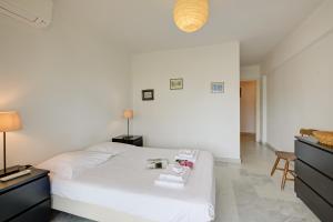 Posteľ alebo postele v izbe v ubytovaní L'Ermitage - Happy Rentals