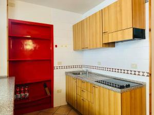 Η κουζίνα ή μικρή κουζίνα στο Appartamento nel cuore della Val di Fassa