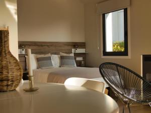 A bed or beds in a room at Alto da Pousa