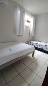 Ένα ή περισσότερα κρεβάτια σε δωμάτιο στο Brisa mar - CASA CENTRO DE PRADO