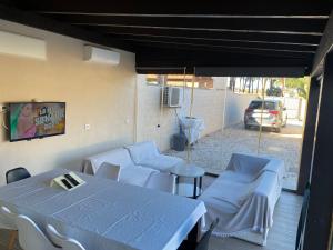 TV a/nebo společenská místnost v ubytování El Rincon de Piedra - Tu Hogar En Vacaciones