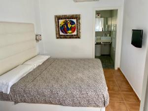 Postel nebo postele na pokoji v ubytování El Rincon de Piedra - Tu Hogar En Vacaciones