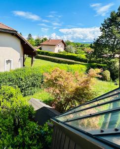 a view from the balcony of a house at Beausoleil SPA Villa XL-Geneva & Lake & Mountains-Wilena Home, Full Love in Chens-sur-Léman