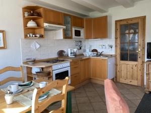 Kuchyň nebo kuchyňský kout v ubytování Ferienwohnung Nr 07 OG Spitzboden