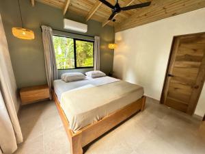 Letto o letti in una camera di Casa Latte