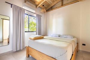 Letto o letti in una camera di Casa Latte