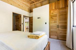 Letto o letti in una camera di Casa Latte