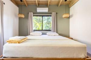 Letto o letti in una camera di Casa Latte