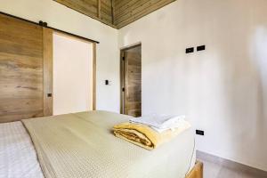 Letto o letti in una camera di Casa Latte