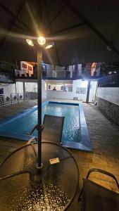 Bazén v ubytování House Beach Brasil nebo v jeho okolí