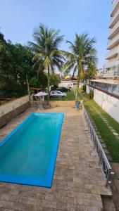 Bazén v ubytování House Beach Brasil nebo v jeho okolí