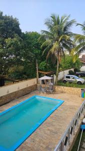 Bazén v ubytování House Beach Brasil nebo v jeho okolí