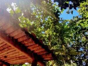 Foto da galeria de Chalés Guigó-Cumuruxatiba, sossego e privacidade em Cumuruxatiba